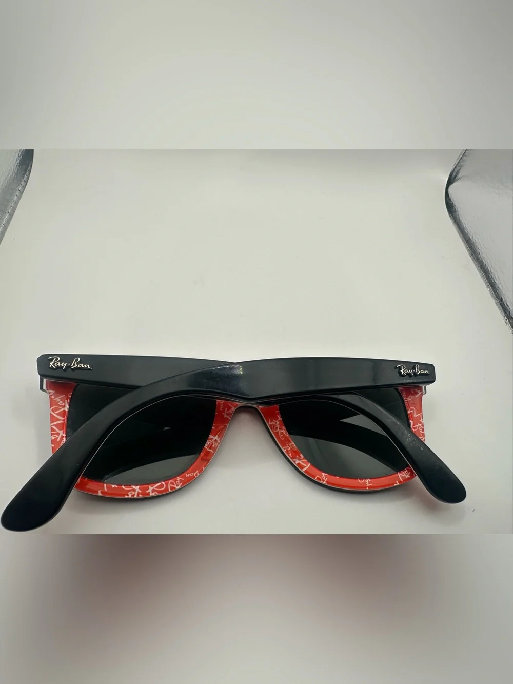 Ray-Ban Black Frame Sunglasses with Red Temples and Green Lenses